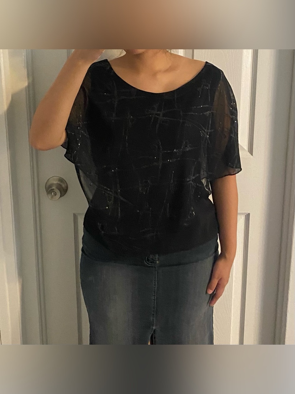 Black poncho blouse with sheer overlay